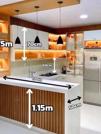 I believe every inch of space matters, especially in a compact kitchen. This design shows how I plan for maximum utility, incorporating a breakfast bar, smart storage, and layered lighting. The dimensions here give you a clear idea of how we can create a perfect kitchen layout even in smaller homes.