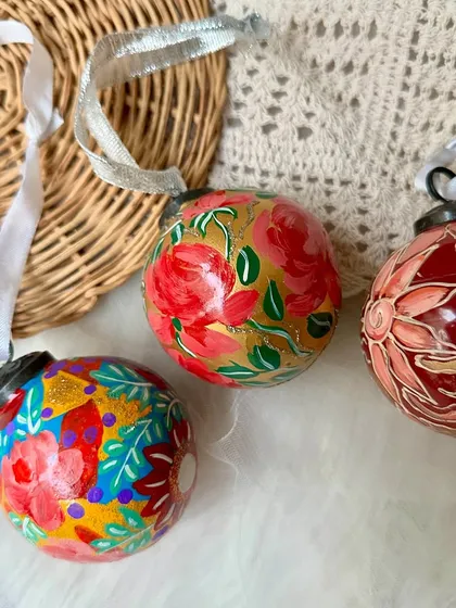 Feeling the Christmas spirit with our hand-painted bauble ornaments.