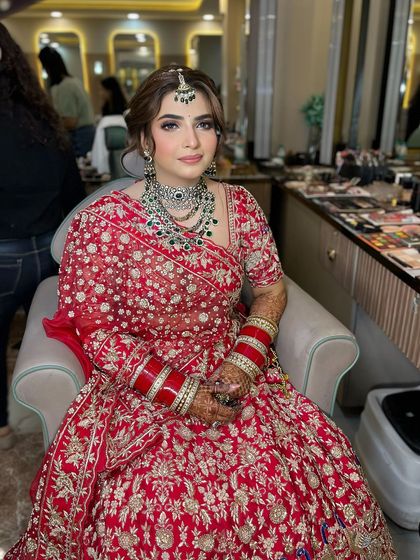 A celebrity-inspired bridal look for this stunning bride. The makeup is glamorous and picture-perfect, designed to make her feel like a star on her wedding day.