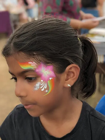 A rainbow flower design with a touch of silver glitter, combining two popular elements into one beautiful piece.