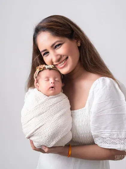 A mother and her newborn, a portrait of pure love and adoration.