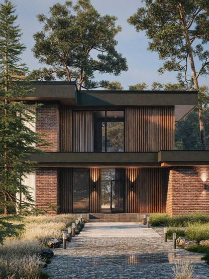 The entrance of the modern woodland house, where we've used lighting to create a welcoming pathway. This render demonstrates how we use light to guide the eye and add warmth to a scene.