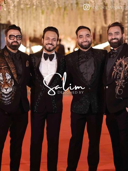 A group of clients on a red carpet, each in a unique custom blazer. From a hand-painted tiger to abstract sequin work, this shows the range of my artistic designs.