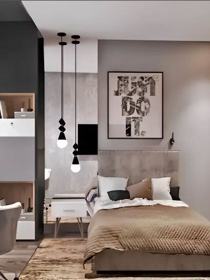 A compact bedroom design with a built-in desk and shelving unit. The monochrome color scheme with wood accents creates a stylish and masculine vibe.