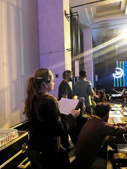 Our show caller with a microphone, directing the team from the console at the TransUnion CIBIL offsite.