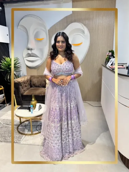 A full-length view of our client in the lovely lavender lehenga. The color is soft and romantic, and the sparkle is perfect for an evening celebration.