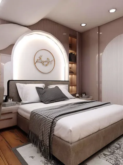 This enchanting bedroom design features a stunning arched headboard with integrated lighting and curved ceiling details. It's a sophisticated yet whimsical space perfect for a growing child.