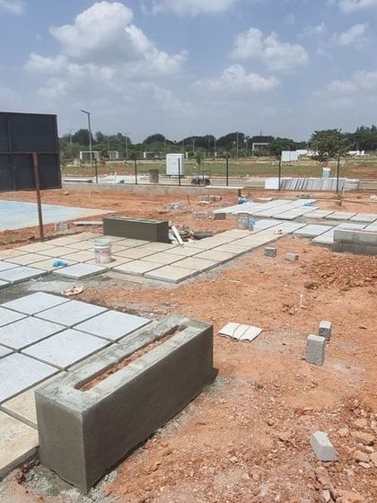 An identical image of the paving work at Aamby City.