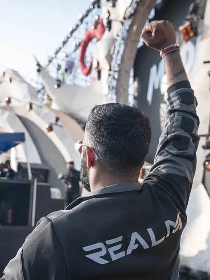 My arm raised in salute to the massive Sunburn crowd. It's a gesture of shared energy, acknowledging the thousands of people who make these festivals unforgettable.