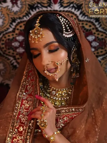 Inspired by the royal aesthetics of Heeramandi, this bridal look features dramatic, smokey eyes and flawless skin. A perfect example of the creative and trending looks you can learn.