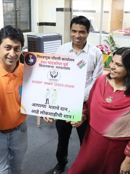 Holding a placard for the SVEEP voter awareness program with my puppet. We performed at various public places to maximize our reach.