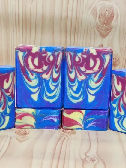 My entry for the drop swirl soap challenge. I used primary colors in a split cup pour, and they merged beautifully to create this rainbow-like effect.