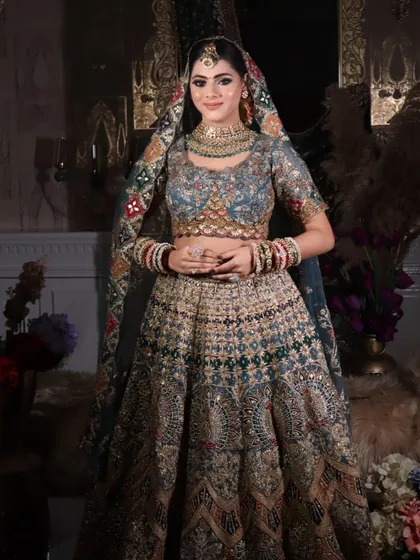 A smiling bride, radiating happiness. The makeup is designed to last through all the emotions of the big day.