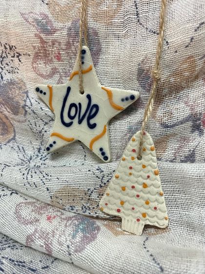 This 'Love' ornament set is painted with a deep blue, offering a different color variation for your holiday decor.
