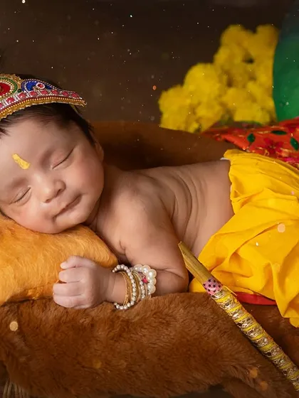 A sweet, sleepy smile from our newborn Krishna. These are the magical, fleeting moments I aim to preserve forever.