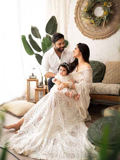 A beautiful family portrait, capturing a candid moment of love and connection.