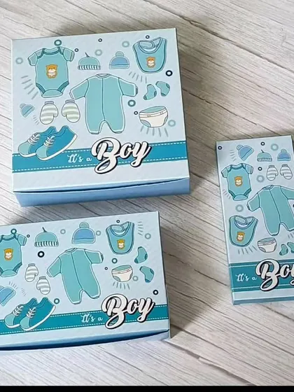 I believe beautiful announcements shouldn't break the bank. These are my budget-friendly 'It's a Boy' themed boxes, perfect for filling with my handmade chocolates or other small treats.