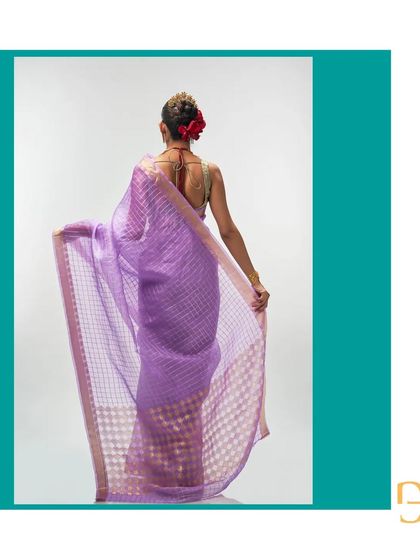 Another angle showing the graceful drape of the African Violet saree, a perfect example of modern occasion wear.