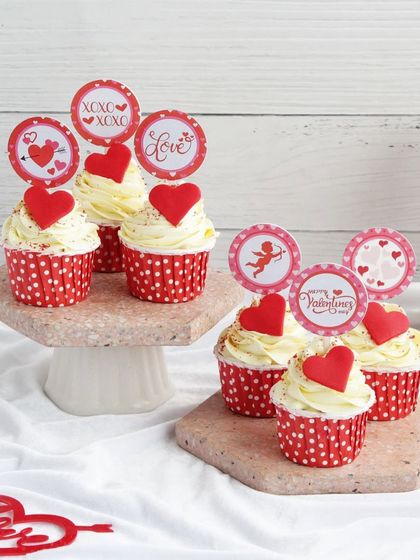 Our vanilla cupcakes with red hearts and cute toppers are another sweet option for your Valentine.