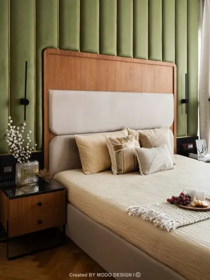 A bedroom that whispers serenity. We curated this space to feel like a warm embrace, using soft hues, warm light, and the quiet companionship of greenery to ensure mornings feel lighter and evenings feel calmer.