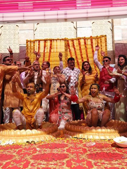 When Haldi turns into Holi. A fun, chaotic, and happy group photo from the Haldi ceremony, capturing the true spirit of the celebration.