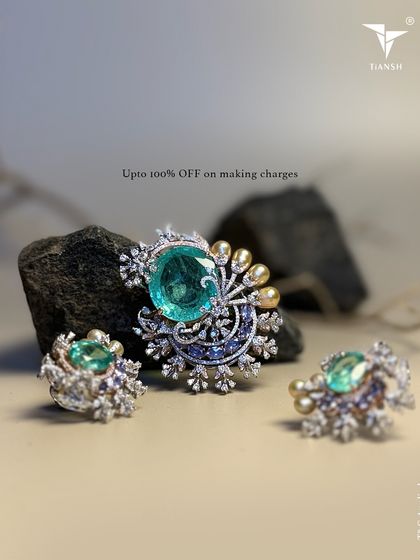 This stunning pendant and earring set, featuring large gemstones and diamonds, is another treasure from my Dhanteras collection, offered with special making charges.