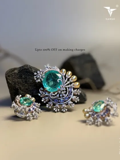 This stunning pendant and earring set, featuring large gemstones and diamonds, is another treasure from my Dhanteras collection, offered with special making charges.