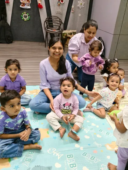 Here I am with some of my wonderful students. Creating a warm, nurturing space where every child feels seen and comfortable is the most important part of what I do.
