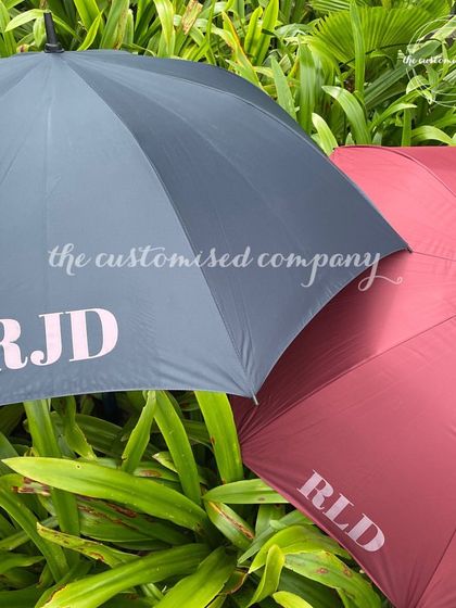 Elevate your weather game with a touch of personalization. Our high-quality umbrellas can be customized with initials, making them a great corporate or personal gift for any season.