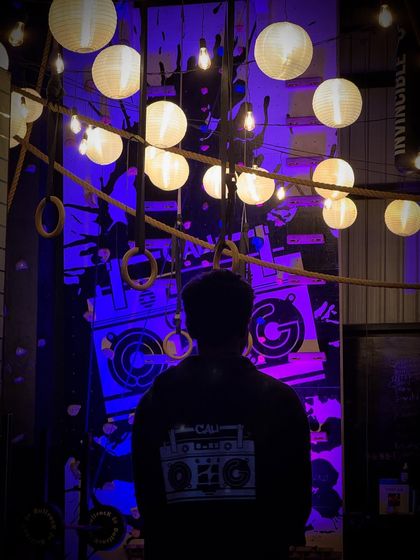 Three years of magic. This image captures the cool, atmospheric vibe of our gym at night, a place where transformations happen.