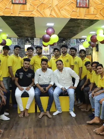 A group photo with my talented students and brothers, the next generation of mehndi artists.