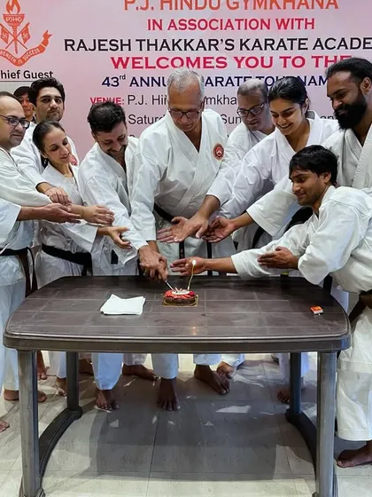 A moment of celebration and unity. Our instructors come together to honor 44 years of the academy's journey and the incredible impact of our founder, Kyoshi Sensei.