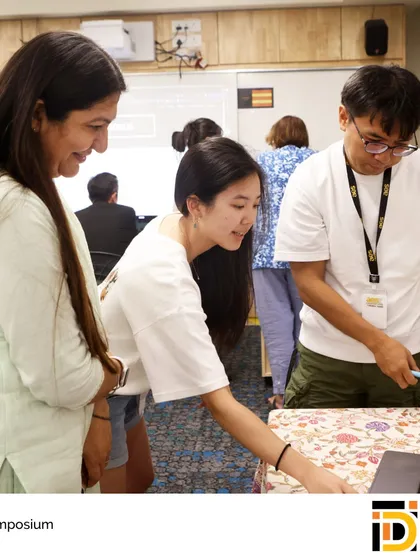 Students and faculty collaborate and discuss an IDI project. This hands-on, inquiry-based learning is a hallmark of our educational philosophy and a key differentiator for our graduates.