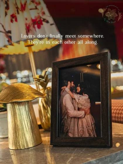 "Lovers don't finally meet somewhere. They're in each other all along." A framed photo of a couple, a small detail that tells a big story.