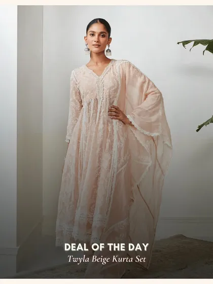 Another look at the Twyla Beige Kurta Set. The delicate lace and gathered waist add a touch of romance to this beautiful, neutral-toned outfit.