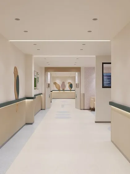 Another perspective of the pediatric ICU corridor, showing how the bird motifs are integrated along the wall. This biophilic-inspired art serves as a positive distraction and a simple wayfinding element, making the space feel friendly and less clinical.