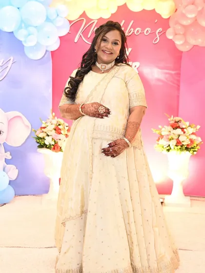 A glowing look for a mom-to-be at her baby shower. The makeup is soft and radiant, making her look and feel special on her big day.