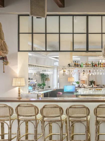 The bar at EVE in Powai is designed to be a space that connects with people. We used natural materials like rattan for the bar stools and oversized woven pendant lights to create a sense of nostalgia and comfort in a bustling city.