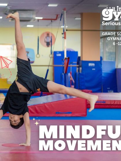 A young boy executes a handstand, a key skill in grade school gymnastics. This move requires significant core strength, balance, and concentration, all of which are developed in my program.