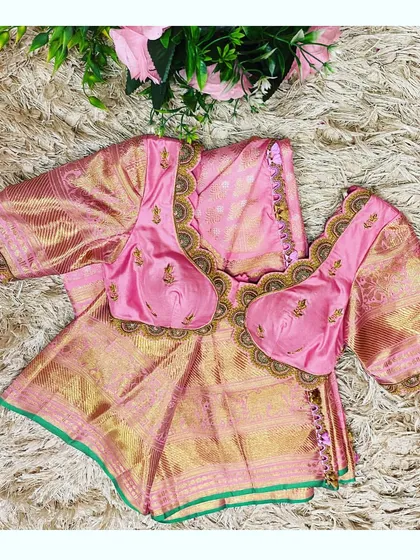 Another angle of the pink saree and custom blouse, showing the intricate details and the perfect color match.