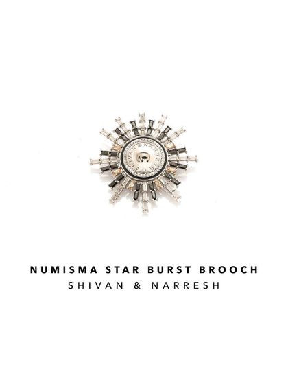 The Numisma Star Burst Brooch, a statement piece that combines modern design with classic glamour. It can be worn as a brooch on a jacket or even as an accessory on a turban.