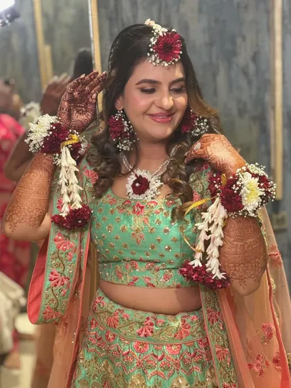 A beautiful, vibrant Haldi look, the second of three transformations for this lovely bride.