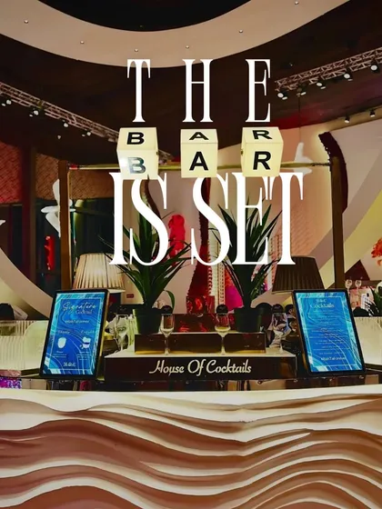 The bar is set and ready for action. This setup features our custom "BAR" light blocks and digital menus, signaling to guests that they're in for a night of great drinks and good times.