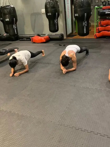 The plank is a simple but brutal test of core stability and mental toughness. Holding this position builds the endurance needed to stay strong and maintain posture during a physical struggle.