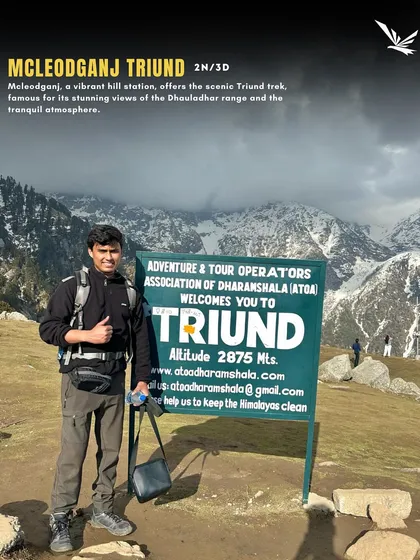 A solo trekker at the famous Triund sign, with the mighty Dhauladhar range in the background. This could be you.