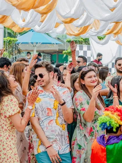 Friends and family having a blast at the pool party, a perfect way to celebrate in a fun and relaxed manner.