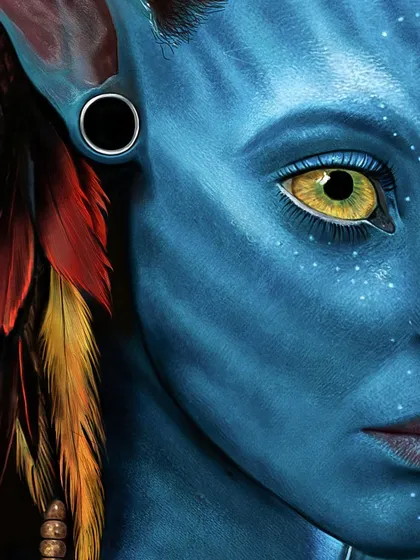 Here is a closer look at the side of Neytiri's face, showing the detail in her ear, the gauge earring, and the texture of the colorful feathers. Each element was painted individually to contribute to the overall realism.