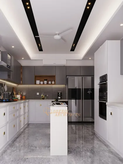 Another view of the parallel kitchen, showing the integrated appliances and the effective use of track lighting on the ceiling.