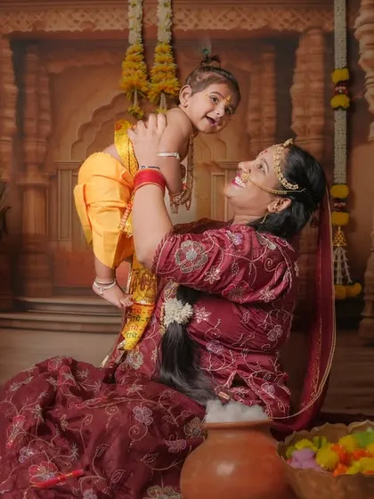 I believe in capturing the magic in everyday moments. For this mother and child portrait, we created a divine Krishna-themed setup in my studio, turning a simple photoshoot into a cherished memory filled with love and innocence.