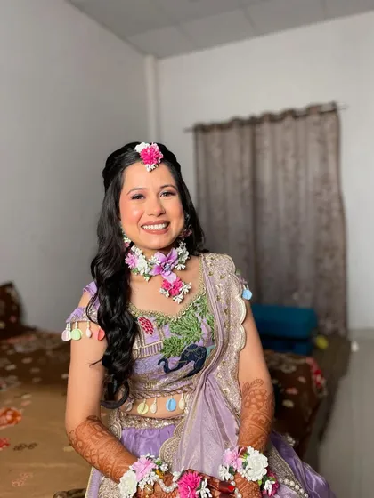 The perfect Haldi glow. The makeup is light and waterproof, ensuring it stays put throughout the ceremony.